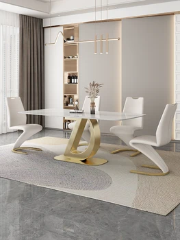 Комбинация от кухненската маса и стол от шисти Малък апартамент Модерен минималистичен светъл луксозна маса за хранене от висок клас неръждаема стомана